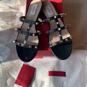 Valentino Garavani Black Rockstud Slide Sandal, casual & polished.